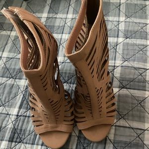 Pink zip up high heels